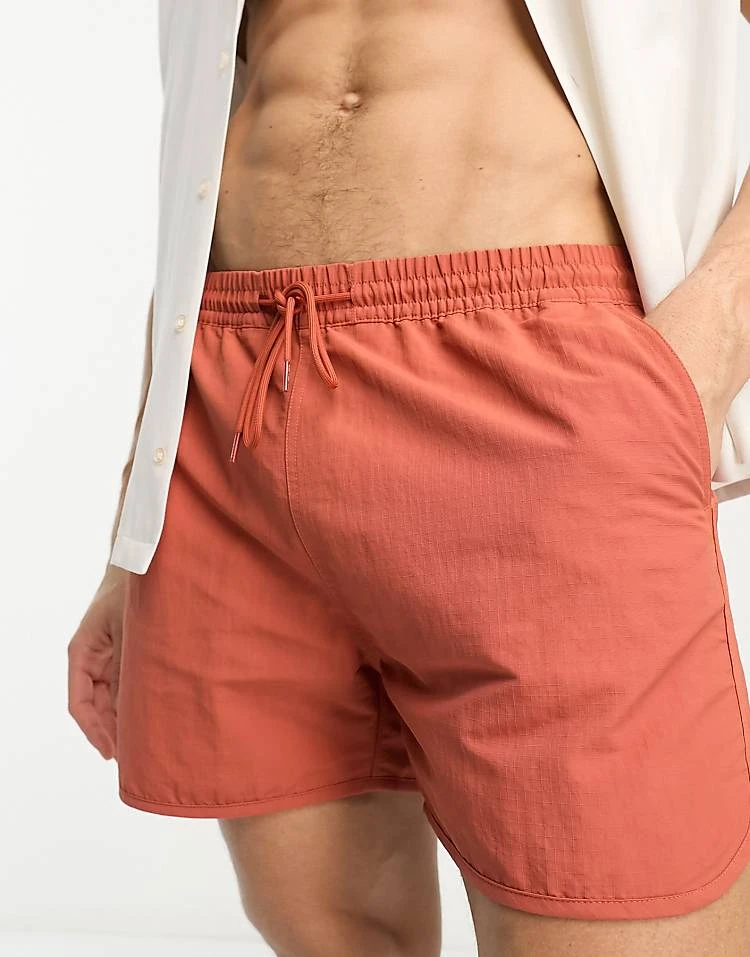 Carhartt WIP Rune Swim Shorts In Orange For Men 1 Carhartt WIP Rune Swim Shorts In Orange For Men