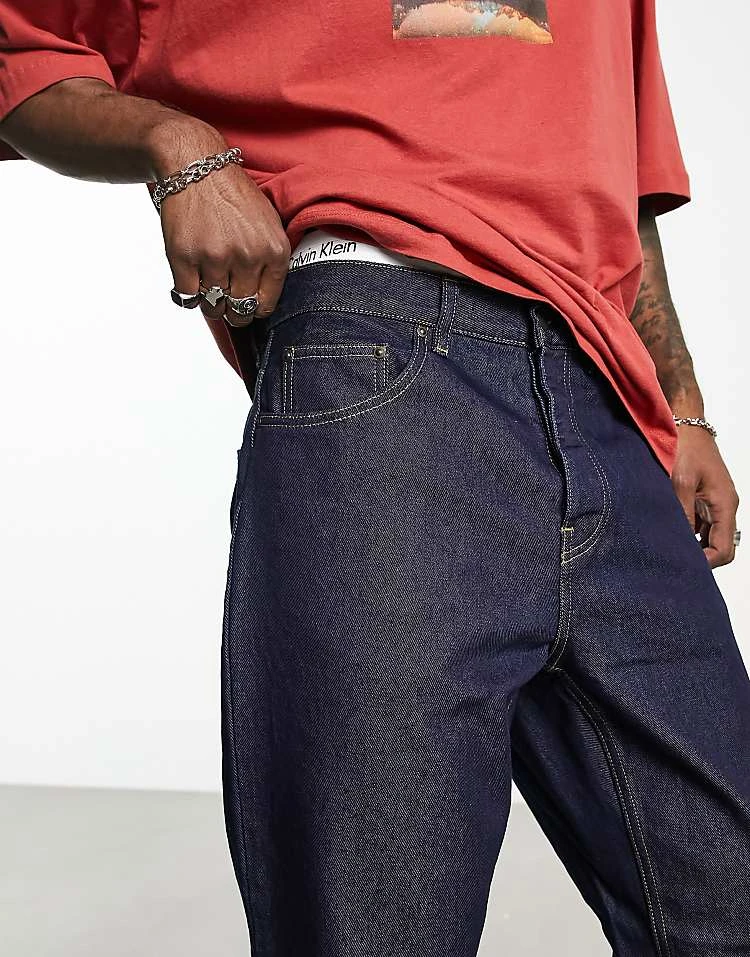 Carhartt WIP Newel Relaxed Tapered Fit Jeans In Blue One Wash For Men 4 Carhartt WIP Newel Relaxed Tapered Fit Jeans In Blue One Wash For Men - Image 4