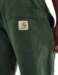 Carhartt WIP Floyde Relaxed Fit Trousers In Green For Men -Carhartt WIP Sales 206638942 3