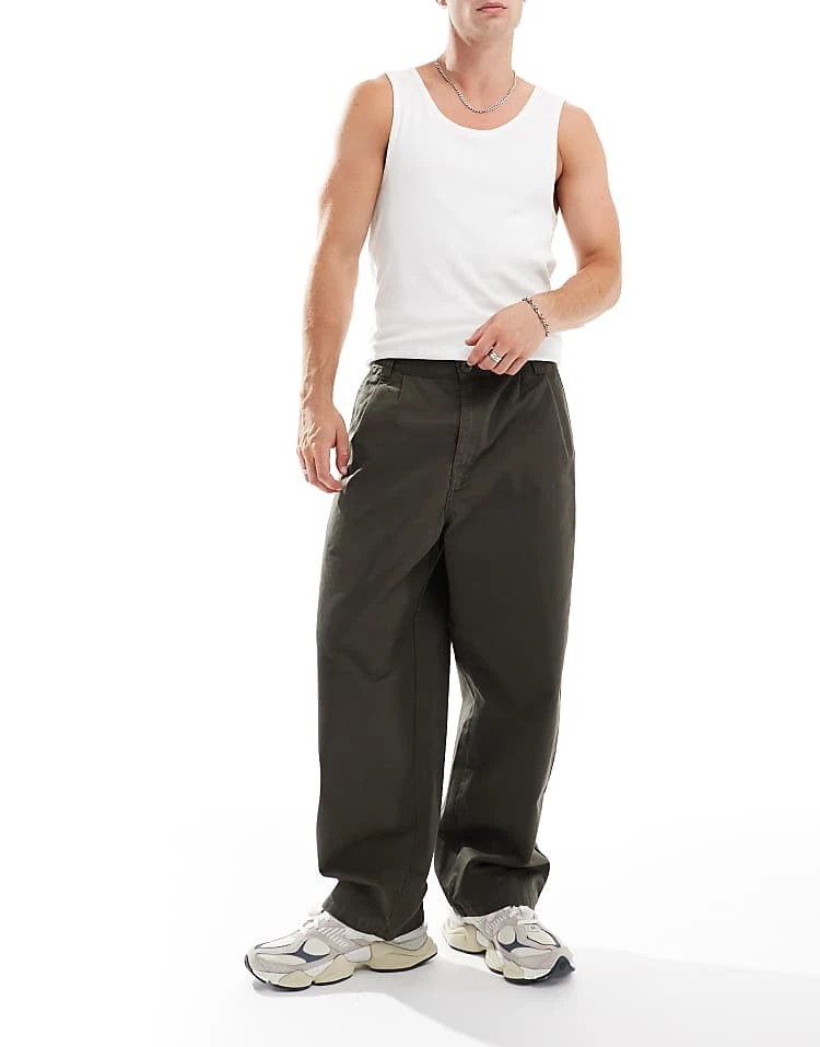 Carhartt WIP Merrick Tapered Fit Trousers In Green For Men 3 Carhartt WIP Merrick Tapered Fit Trousers In Green For Men - Image 3