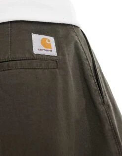 Carhartt WIP Merrick Tapered Fit Trousers In Green For Men 9 Carhartt WIP Merrick Tapered Fit Trousers In Green For Men -Carhartt WIP Sales 206639057 4