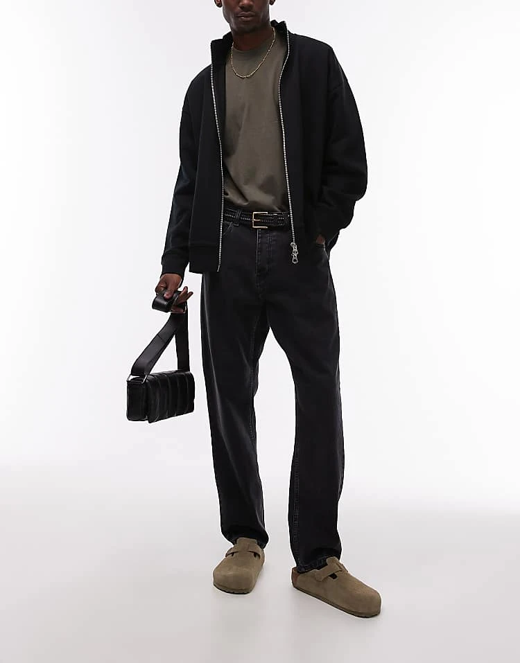 Carhartt WIP Newel Relaxed Tapered Jeans In Black For Men 1 Carhartt WIP Newel Relaxed Tapered Jeans In Black For Men