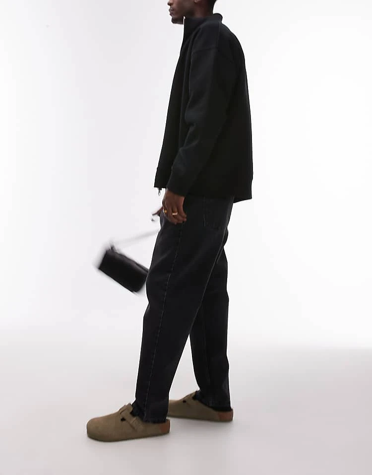 Carhartt WIP Newel Relaxed Tapered Jeans In Black For Men 3 Carhartt WIP Newel Relaxed Tapered Jeans In Black For Men - Image 3