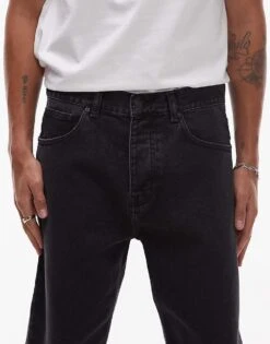 Carhartt WIP Newel Relaxed Tapered Fit Jeans In Washed Black For Men -Carhartt WIP Sales 207889538 5