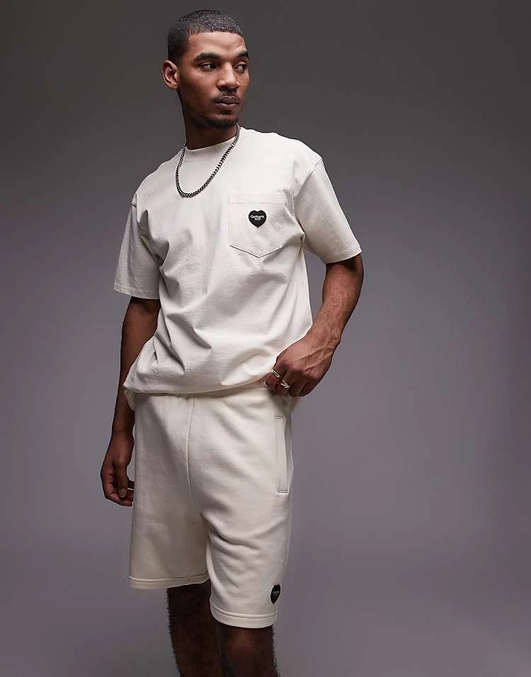 Carhartt WIP Ingo Sweat Shorts In Off White For Men 6 Carhartt WIP Ingo Sweat Shorts In Off White For Men - Image 6