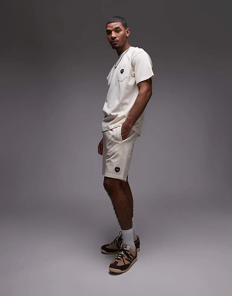 Carhartt WIP Ingo Sweat Shorts In Off White For Men 2 Carhartt WIP Ingo Sweat Shorts In Off White For Men - Image 2